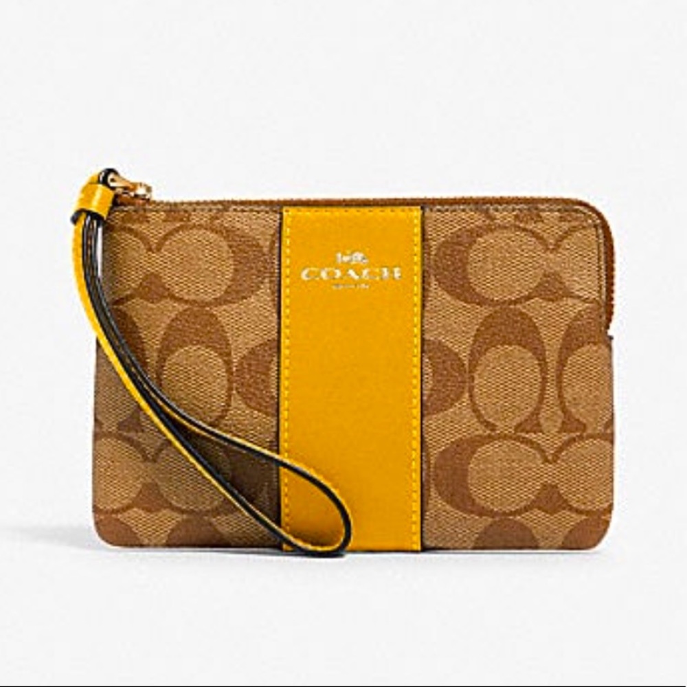 Coach corner zip wristlet in signature canvas